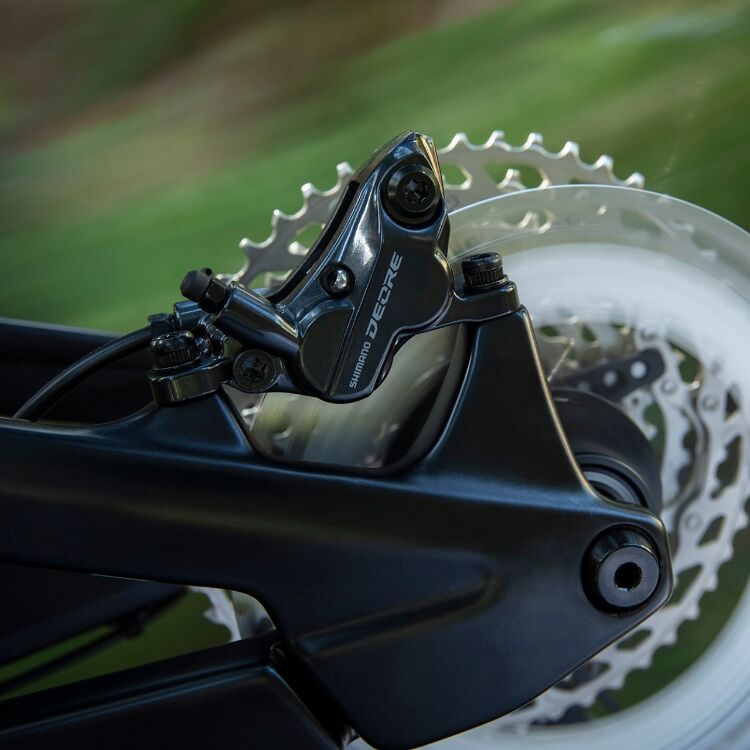 Shimano Deore BR-M6120 4 piston caliper
